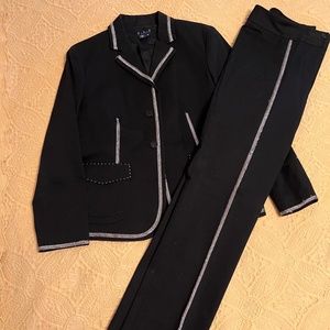 Vintage Magashoni designer pantsuit. 14.  Runs very small. Black with white trim